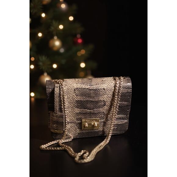 Henri Bendel Handbags - Henri Bendel Waldorf Party Bag Python
Convertible Gold Chain